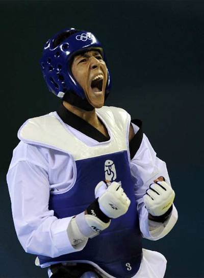 Rohullah Nikpai celebra su triunfo ante el español Ramos.
