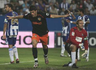 Villa celebra su primer gol, ayer en La Rosaleda.