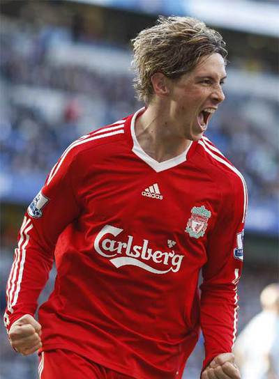 Fernando Torres celebra uno de sus dos goles al Manchester City.