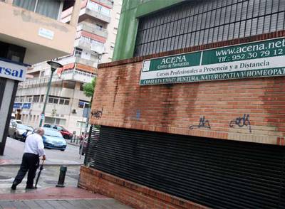 Cartel de la academia ACENA Centro de Formación, en Málaga, investigada por la policía.