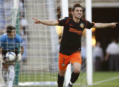 Villa celebra su gol.