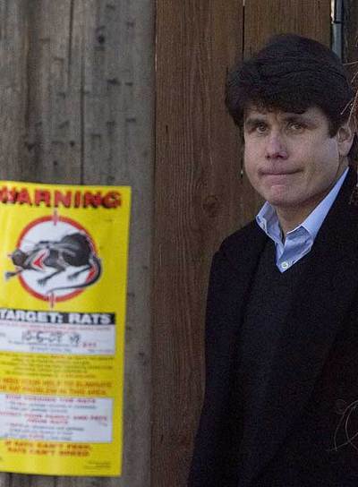 Rod Blagojevich sale de su casa, ayer en Chicago.
