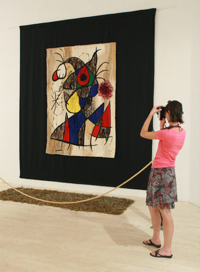  El llangardaix de les plomes d'or,  de magnética textura.