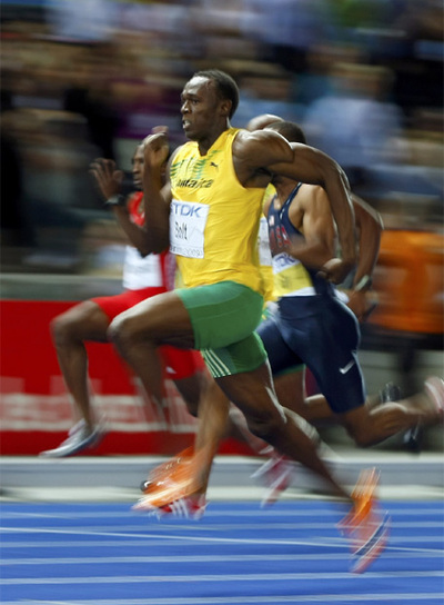 Usain Bolt, en plena carrera.