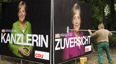 Con la imagen de Angela Merkel, el cartel de propaganda electoral incluye el eslogan: 