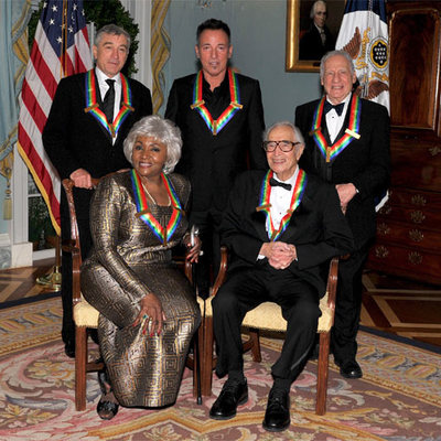 Bumbry y Brooks, sentados delante de De Niro, Springsteen y Brubeck.