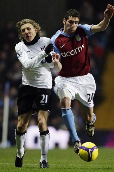 Cuéllar (a la derecha), en la  Premier .