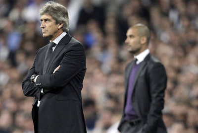 Pellegrini, en primer plano, y Guardiola, en un momento del partido.