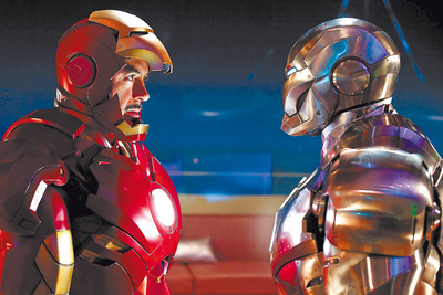  Doble o nada: Robert Downey Jr.,  aka  Tony Stark, enfrentado con War Machine en  Iron Man 2.  rn Una imagen del videojuego. Un jugador experto tardaría por lo menos 12 horas en completarlo. 