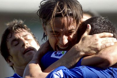 Bermejo, David Prieto y Armenteros celebran el primer gol del Xerez.