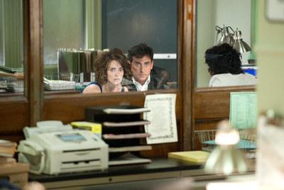 Tina Fey (izquierda) y Steve Carrell sufren en  Noche loca. 