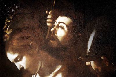 Arriba, detalle de la obra  Martirio de santa Úsula,  de Caravaggio. En este cuadro aparece un autorretrato del pintor.