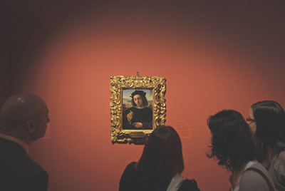  Retrato de un hombre sosteniendo una joya,  de Ridolfo Ghirlandaio.