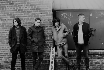 Arctic Monkeys, de izquierda a derecha: Nick O'Malley, Jamie Cook, Alex Turner y Max Helder.
