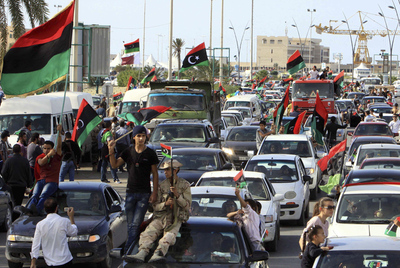 Celebraciones en Trípoli tras el anuncio de la muerte de Muamar el Gadafi.