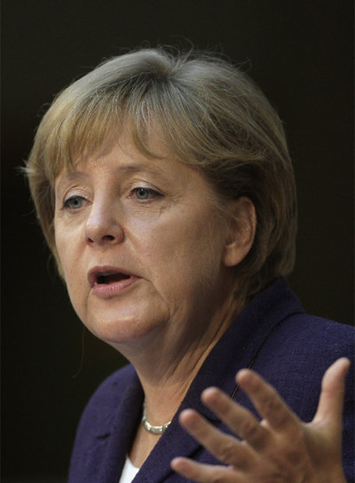 Merkel destaca los "esfuerzos adicionales de ahorro" de España y Portugal