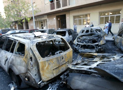 Vehículos quemados la pasada madrugada en la calle de Músico Ginés en Valencia.