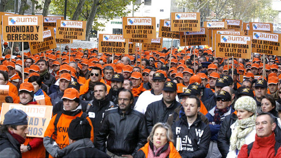 Los participantes en la protesta, convocada por la Asociación Unificada de Militares de España.