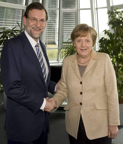 Mariano Rajoy saluda a la canciller alemana, Angela Merkel.
